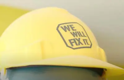 We Will Fix It hard hat