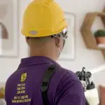 We will fix it employee cleaning with aerosol spray