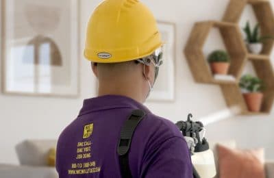We will fix it employee cleaning with aerosol spray