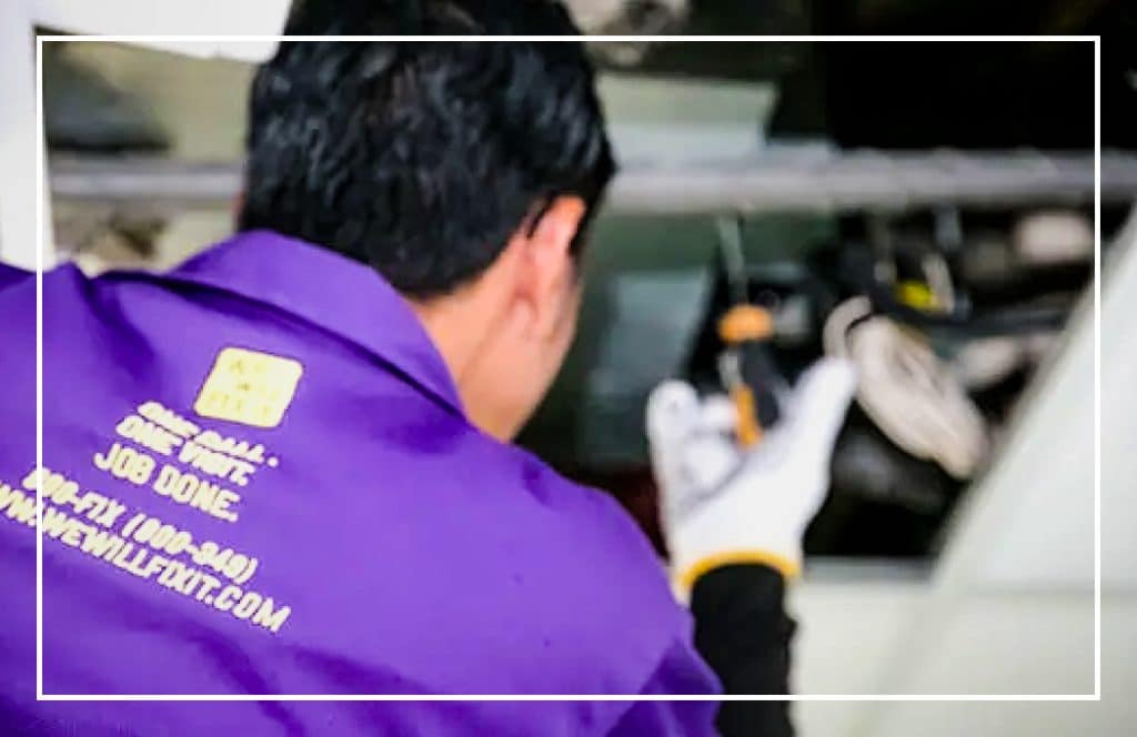 We will fix it employee servicing air conditioner unit