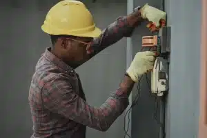 Electrician repairing an electrical socket