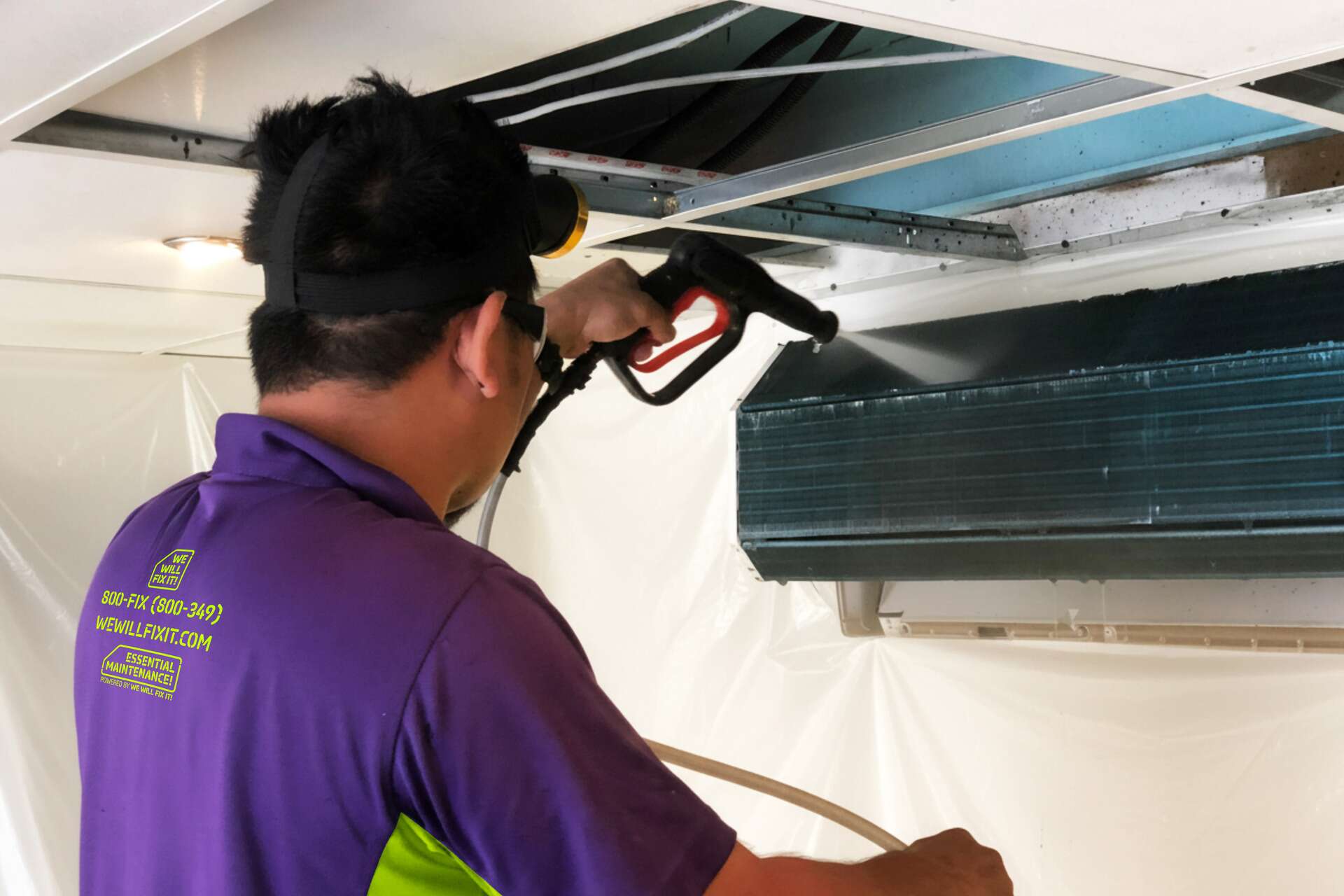 Tech Cleaning An Ac Coil