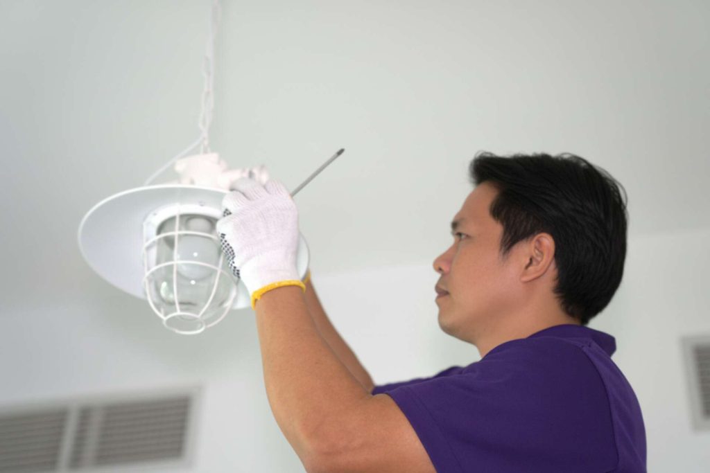 Tech Installing A Light Fitting